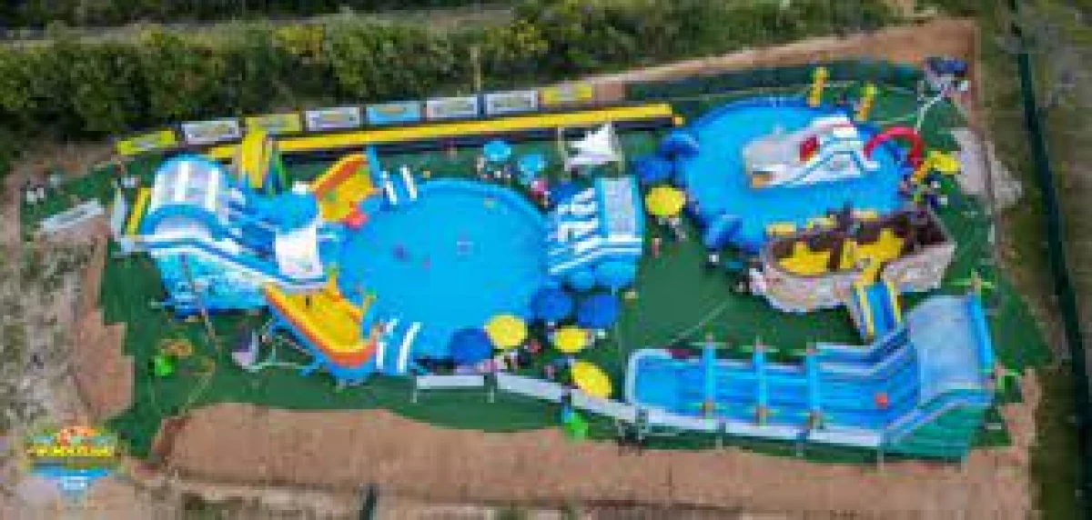 Man dies after bouncy castle blown away at a water park