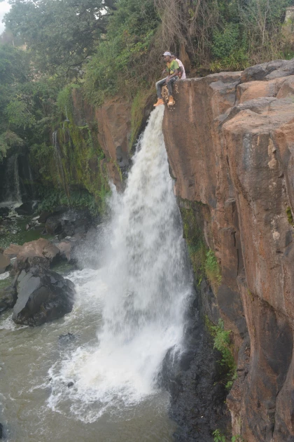 Daredevil youth risk life and limb at Ruiru river waterfall 