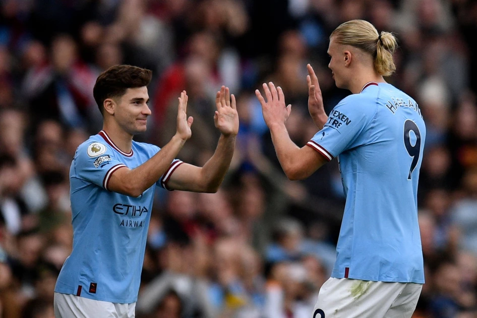 Man City return to Premier League summit 