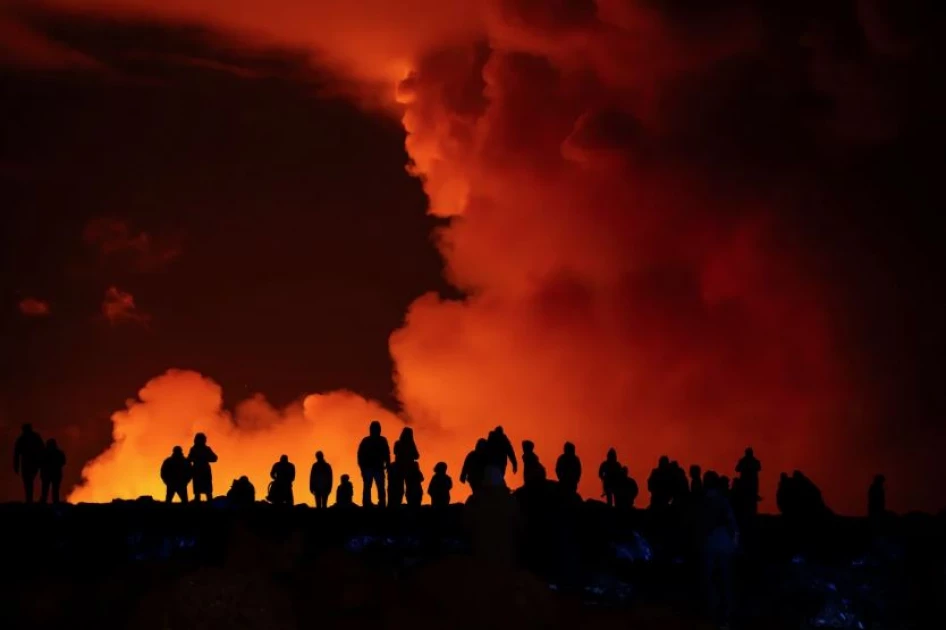 Skies turn red as Iceland volcano erupts