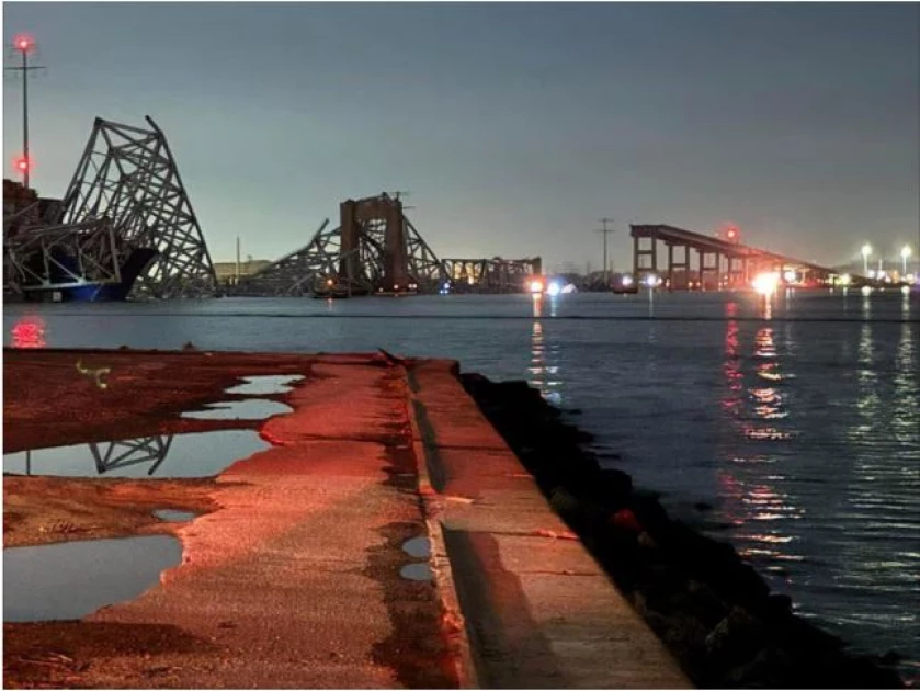 Baltimore bridge collapse: Rescuers search water after ship collision