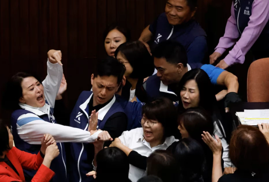 Taiwan lawmakers exchange blows in bitter dispute over parliament reforms