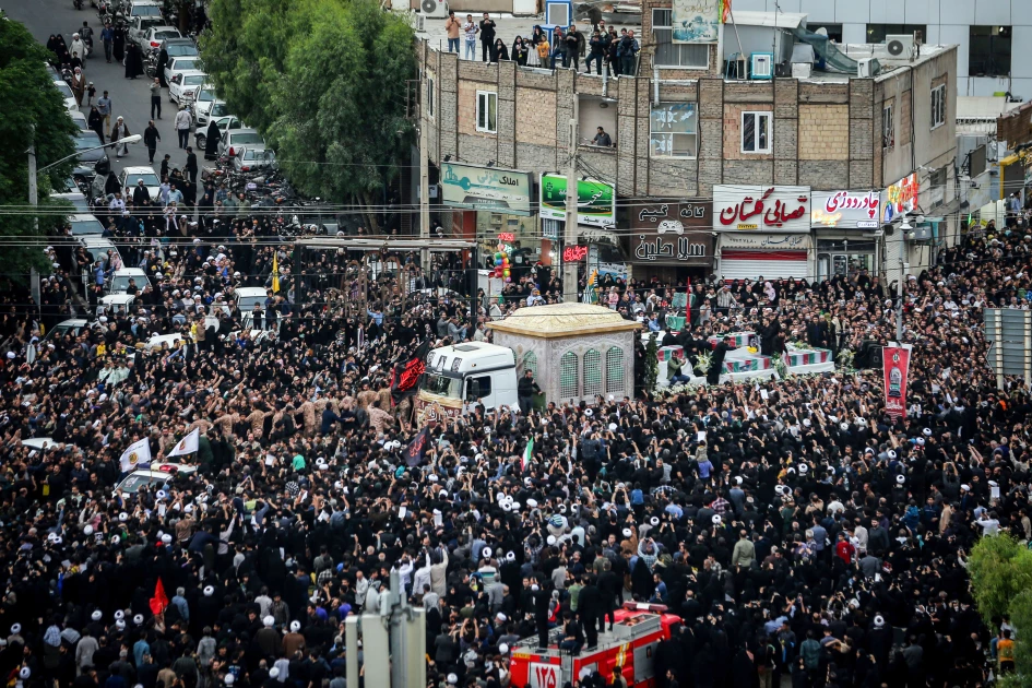 Tens of thousands gather for President Raisi funeral procession in Tehran