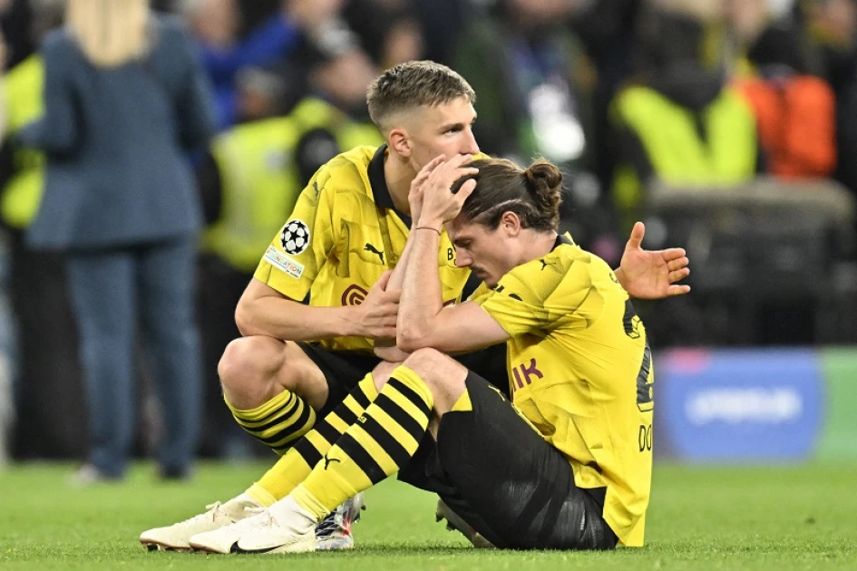 Dortmund's woes continue with German Cup exit at Wolfsburg