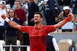 Djokovic stages French Open escape act, Medvedev out