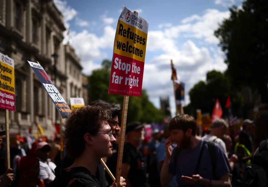 UK police arrest nine after protests in London