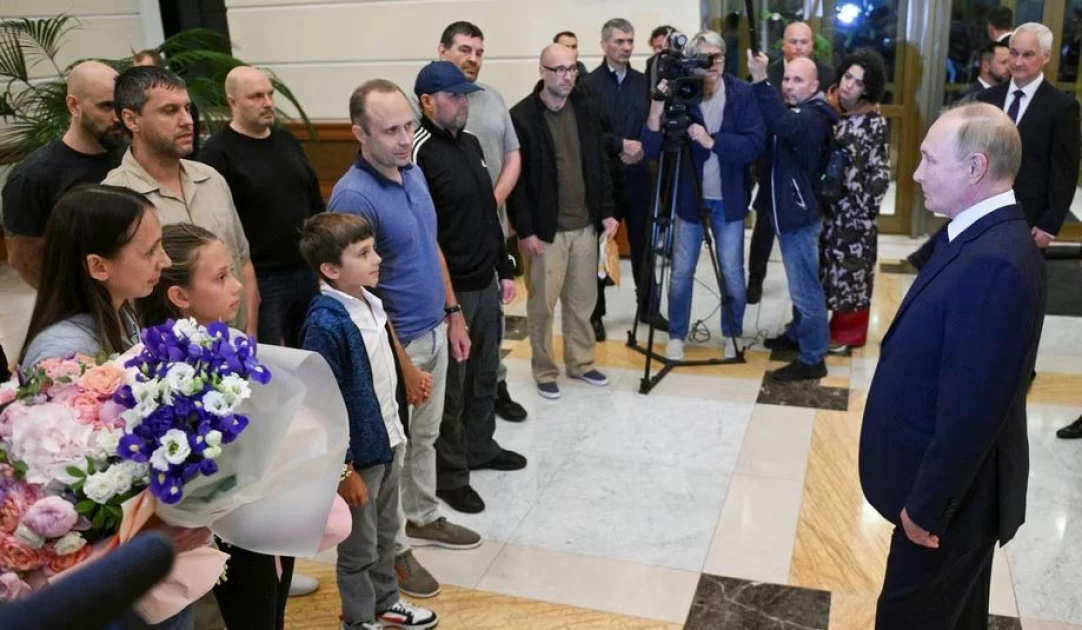 Putin welcomes Russians freed in prisoner swap as heroes