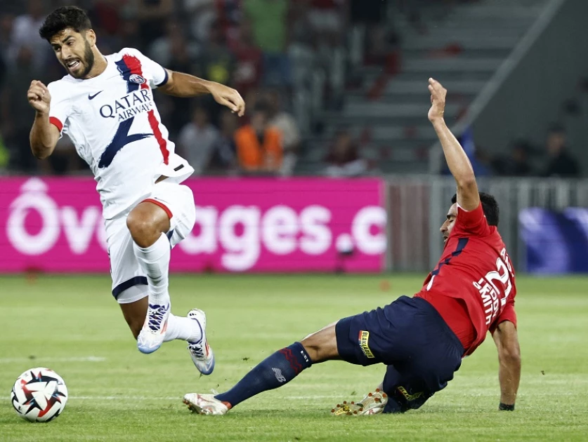 PSG survive stiff Lille test to continue perfect start in Ligue 1