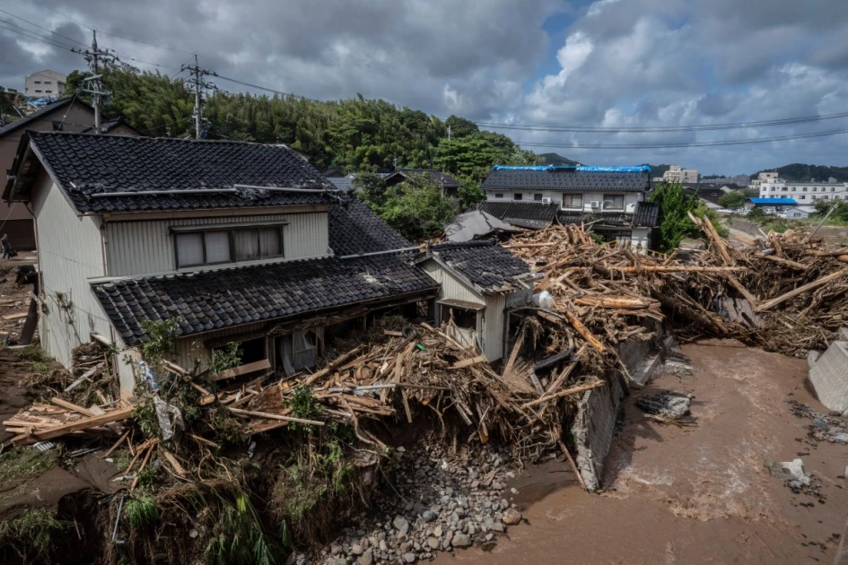 Rescuers comb muddy riverbanks after Japan floods kill six