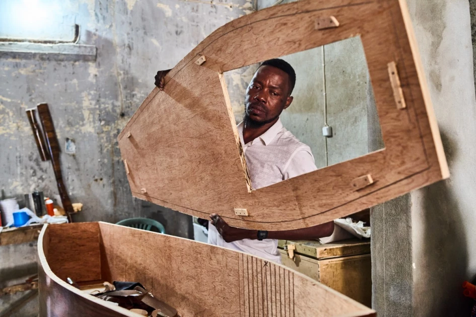 Mozambique's craftsmen repurpose discarded cargo ship pallets to coffins