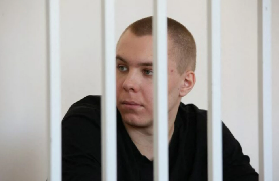 Russian jailed for burning Koran faces new treason trial