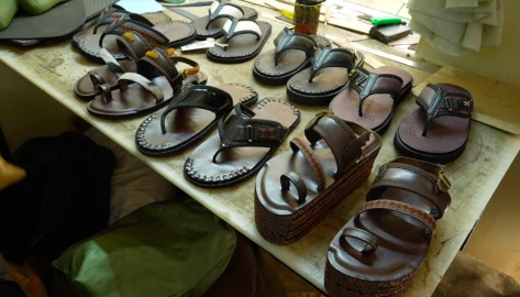 MADE IN KENYA:  Young Kibra entrepreneur upcycling old car tyres into high-end shoes 