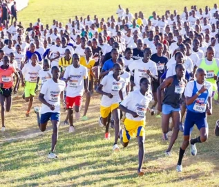 Loice Chekwemoi, Samwel Chebolei toast to Chepsaita Cross Country titles