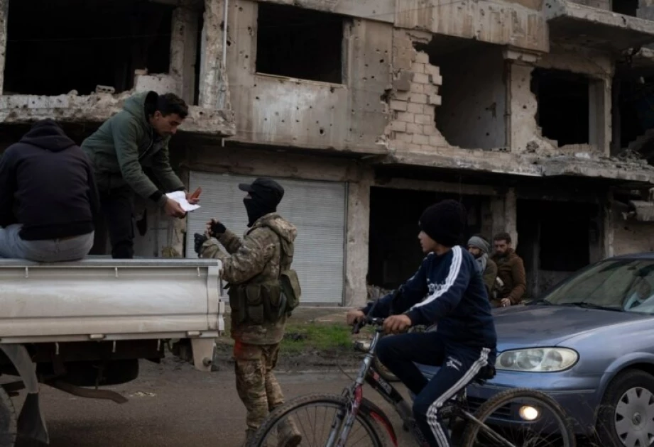 Syrian security forces search for pro-Assad militants in Homs, state media say