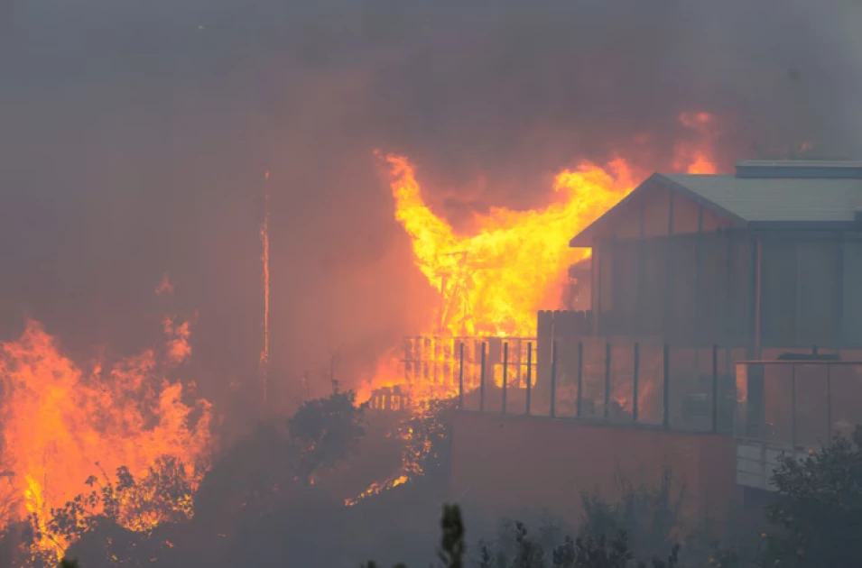 Wildfire rages in Los Angeles, forcing 30,000 to evacuate