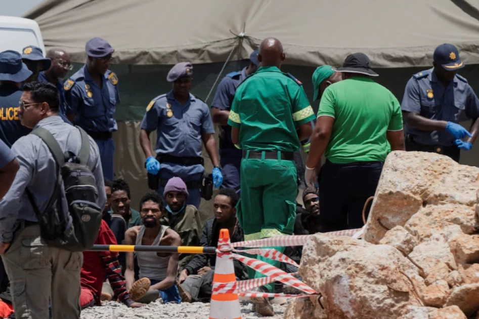 South Africa pulls 36 corpses from illegal mine, arrests 82 survivors