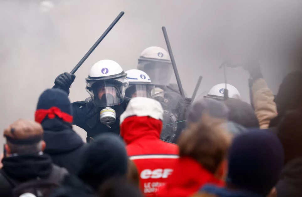 Tens of thousands in Belgium protest over pension reforms, halting air traffic