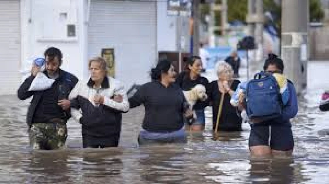 Argentina searches for baby, sister swept away by floods