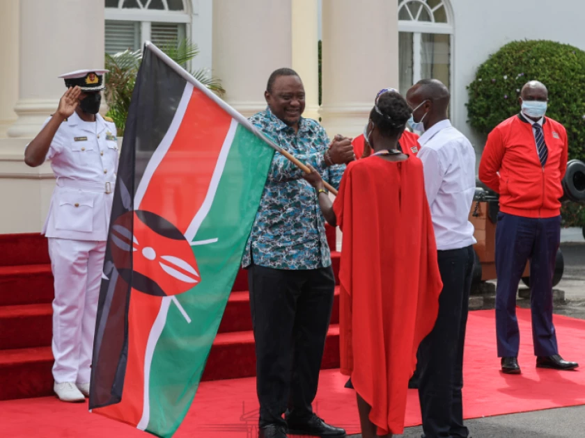 President Kenyatta hands over national flag to Kenya’s Deaflympics team