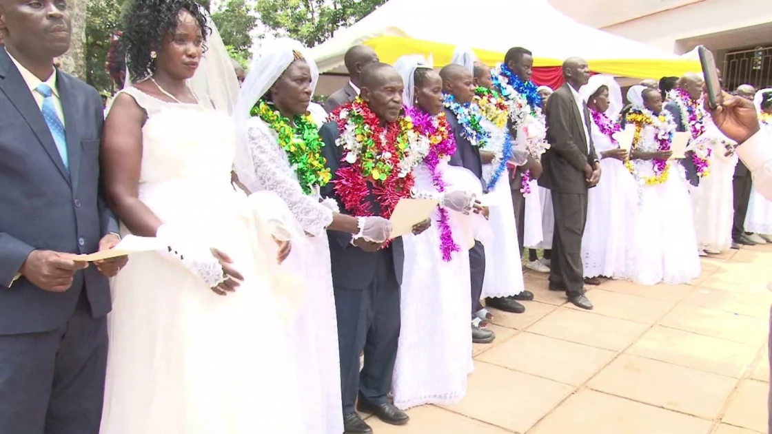 34 couples take part in mass wedding, citing high cost of living