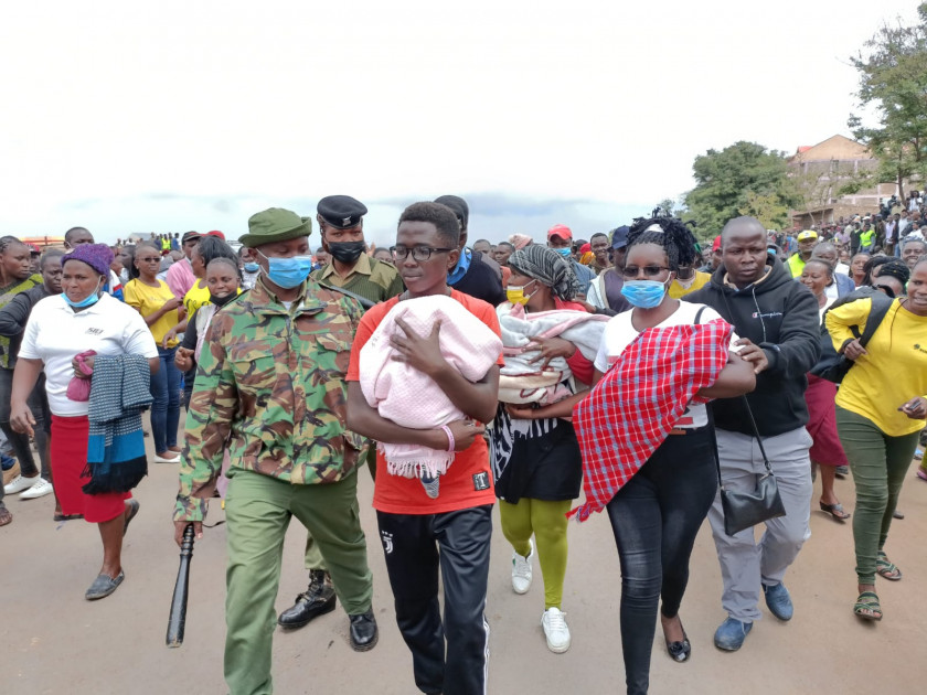 Police escort mother of triplets from rowdy crowd after DP Ruto's Ksh.100K donation