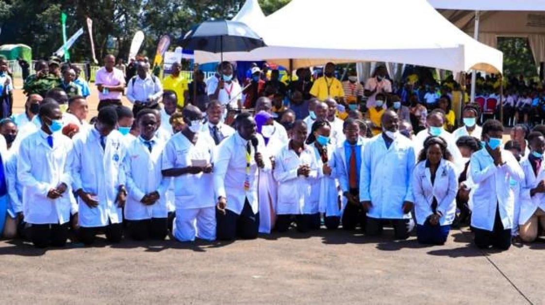Ugandan doctors kneel before Museveni, beg him to run for presidency again in 2026
