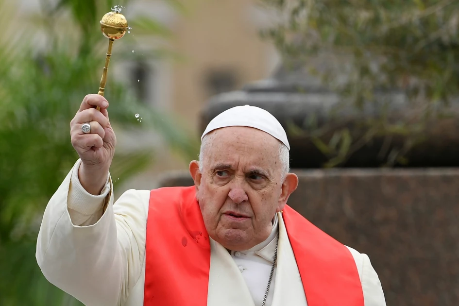 Pope presides over Palm Sunday after hospital stay