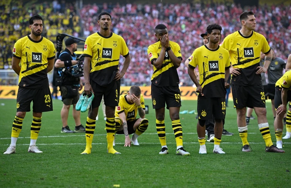 Dortmund face 'brutal' reality as title dream vanishes