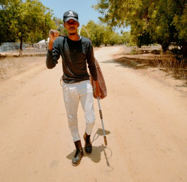 Meet the Snake Whisperer of Mokowe: A young man with a passion for snakes 